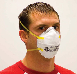 The image shows a person wearing a Filtering Facepiece Air-Purifying R
