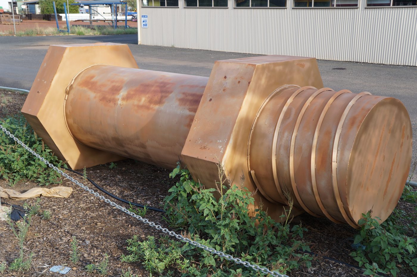 Large bolt sculpture outdoors