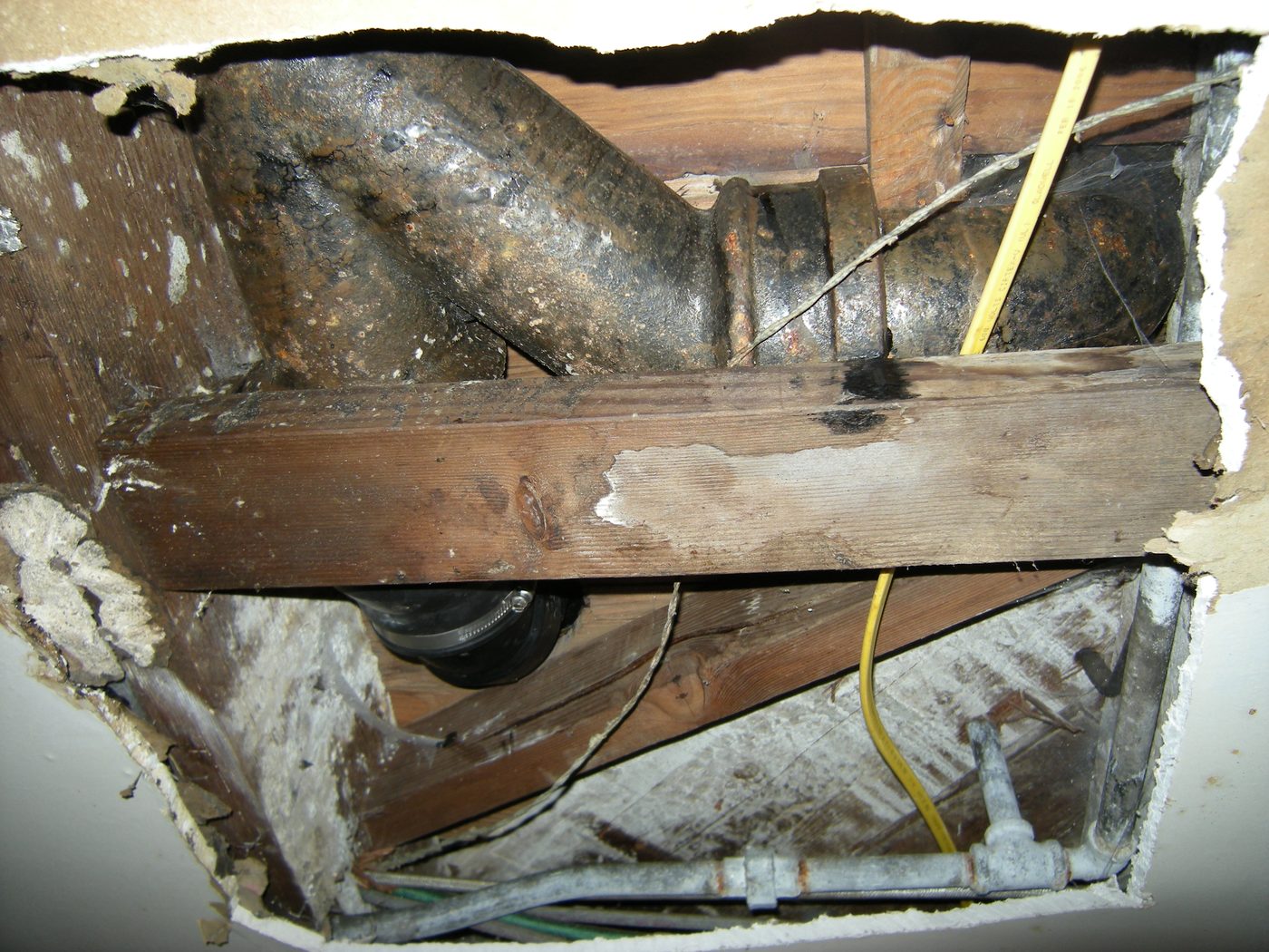 cast iron soil pipe in wall cavity