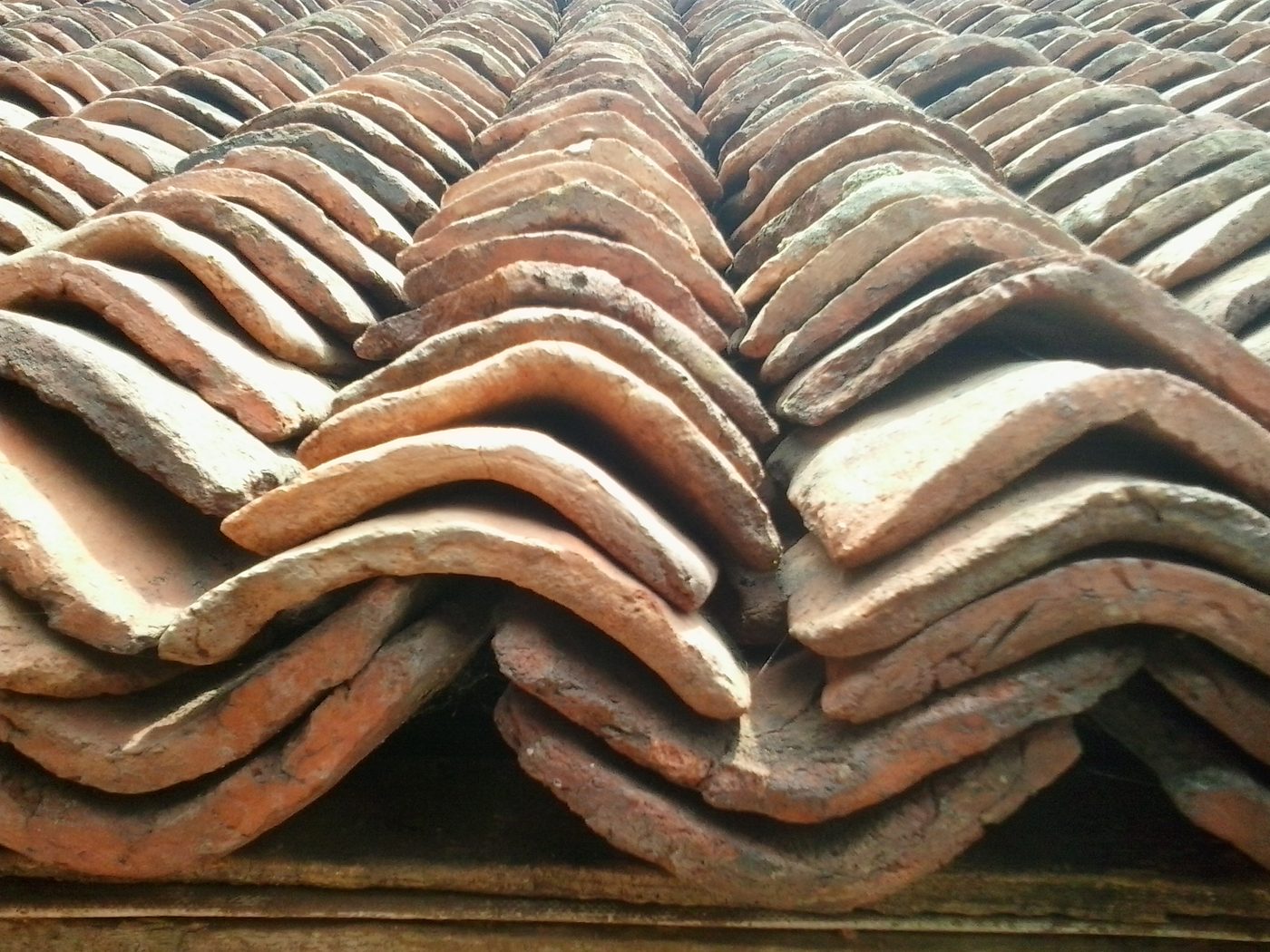 Stacked clay roofing tiles