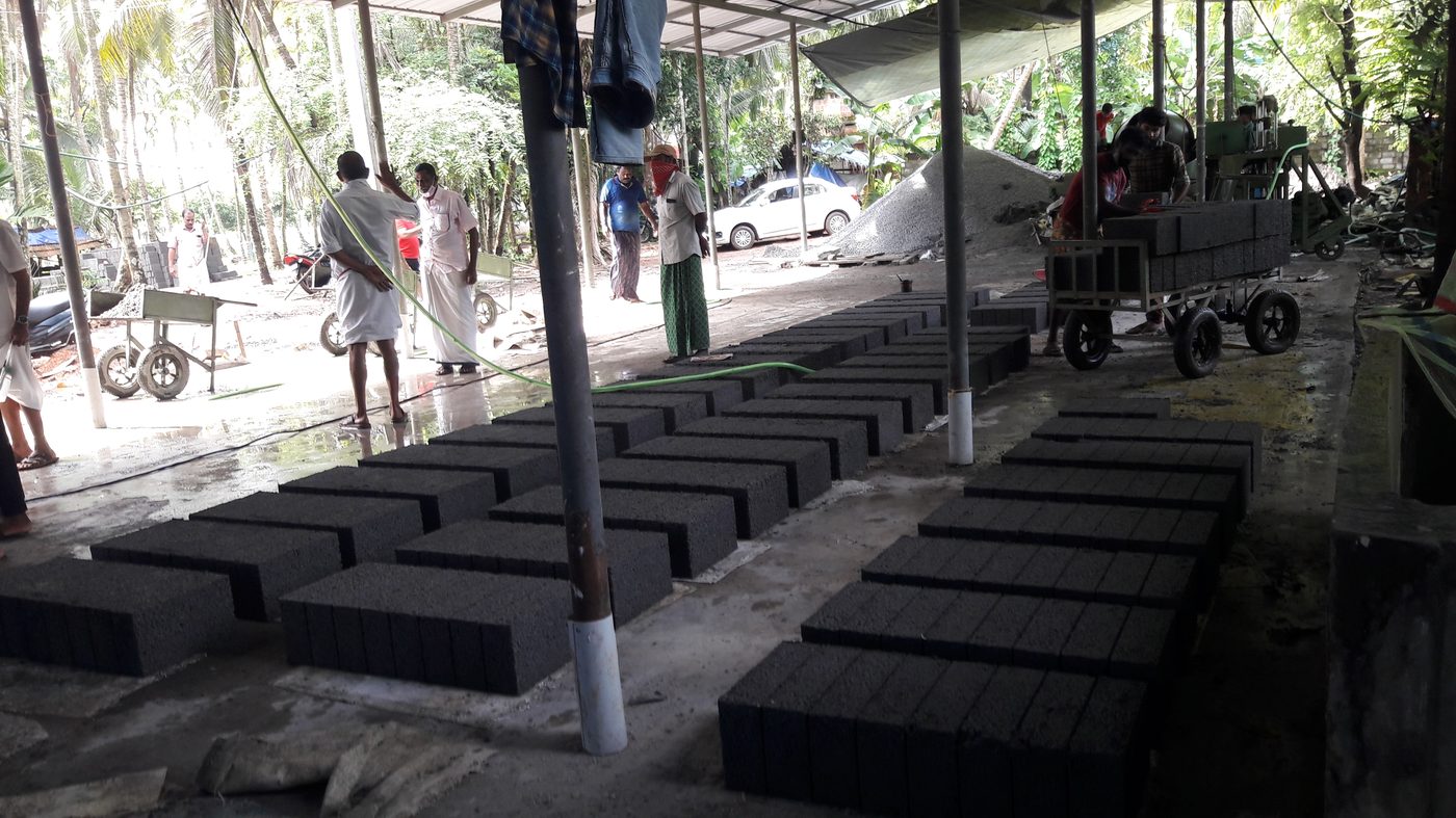 Concrete blocks curing in a shaded area