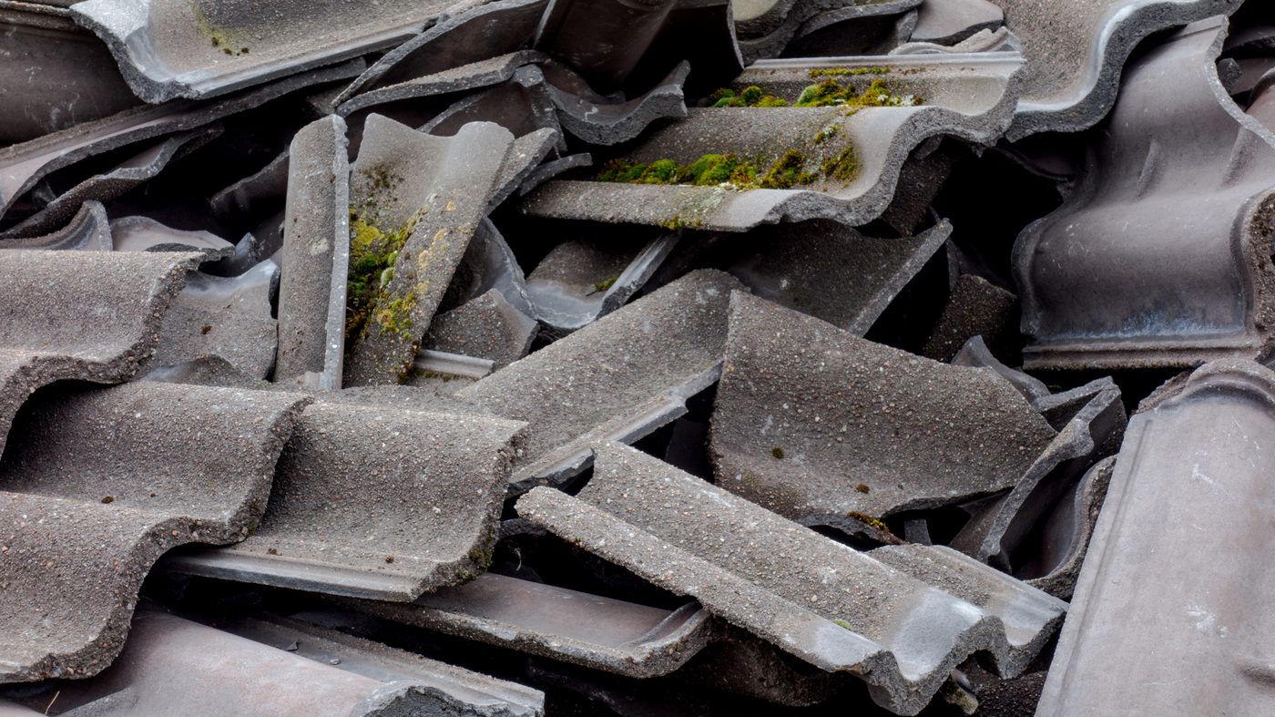 Broken concrete roofing tiles pile