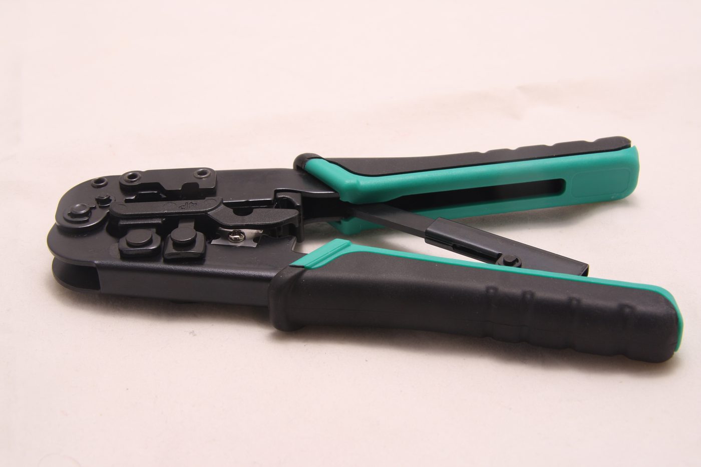 Green and black crimping plier tool