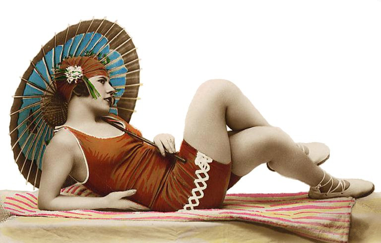 Vintage fashion trend with parasol and swimsuit