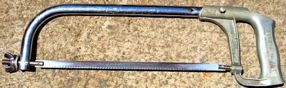 Metal hacksaw with blade and handle