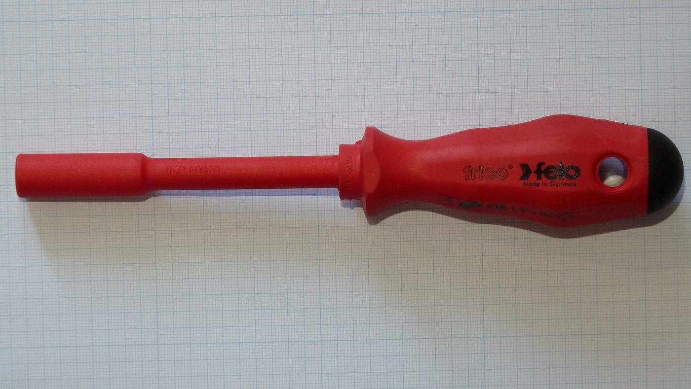 Red insulated screwdriver for electrical work