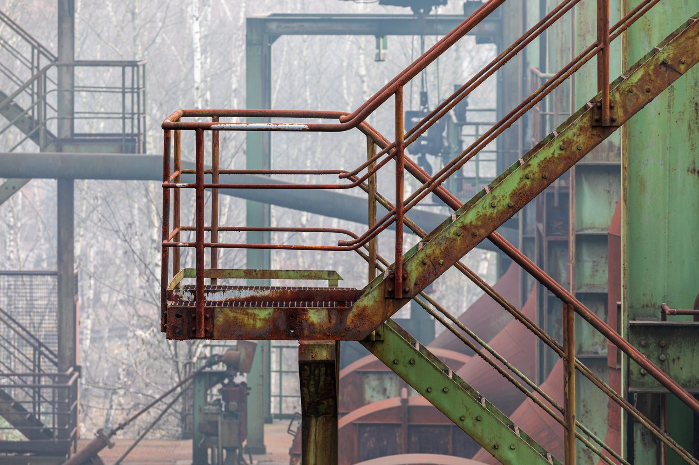 Rusty metal staircase landing platform