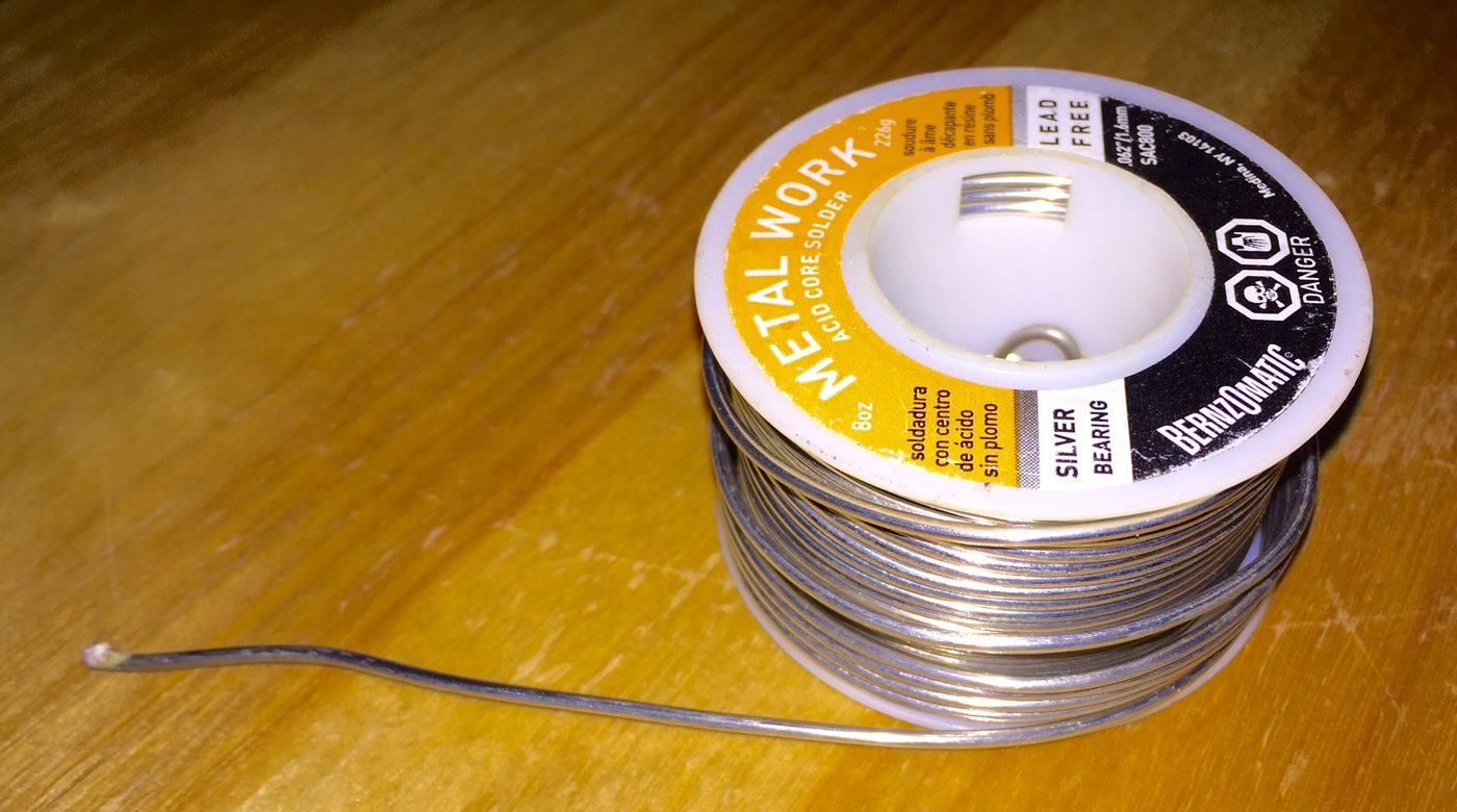 Spool of lead-based solder wire