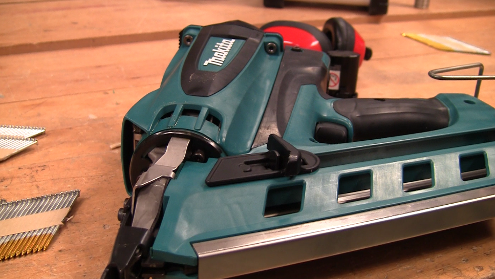Makita brand nail gun on workbench