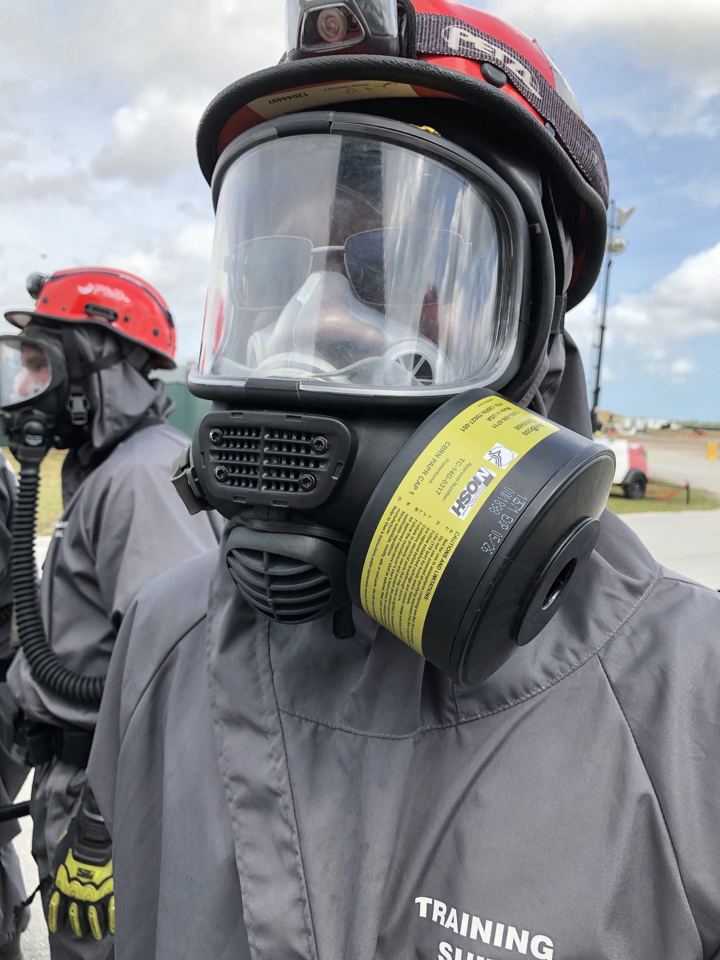 Person wearing powered air-purifying respirator