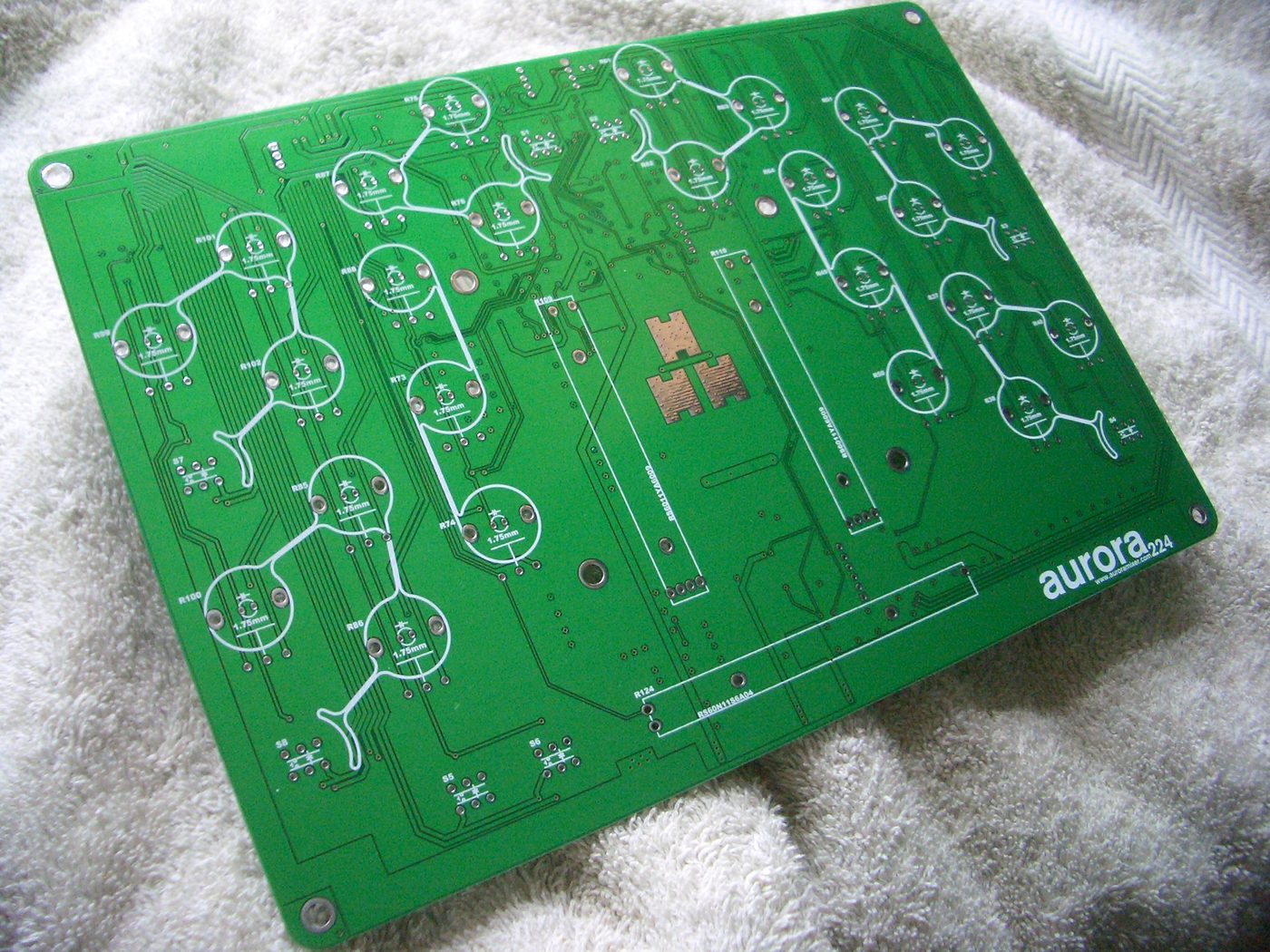 Green printed circuit board with electronic traces