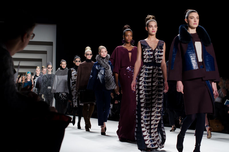 Fashion models showcasing designer clothing on runway