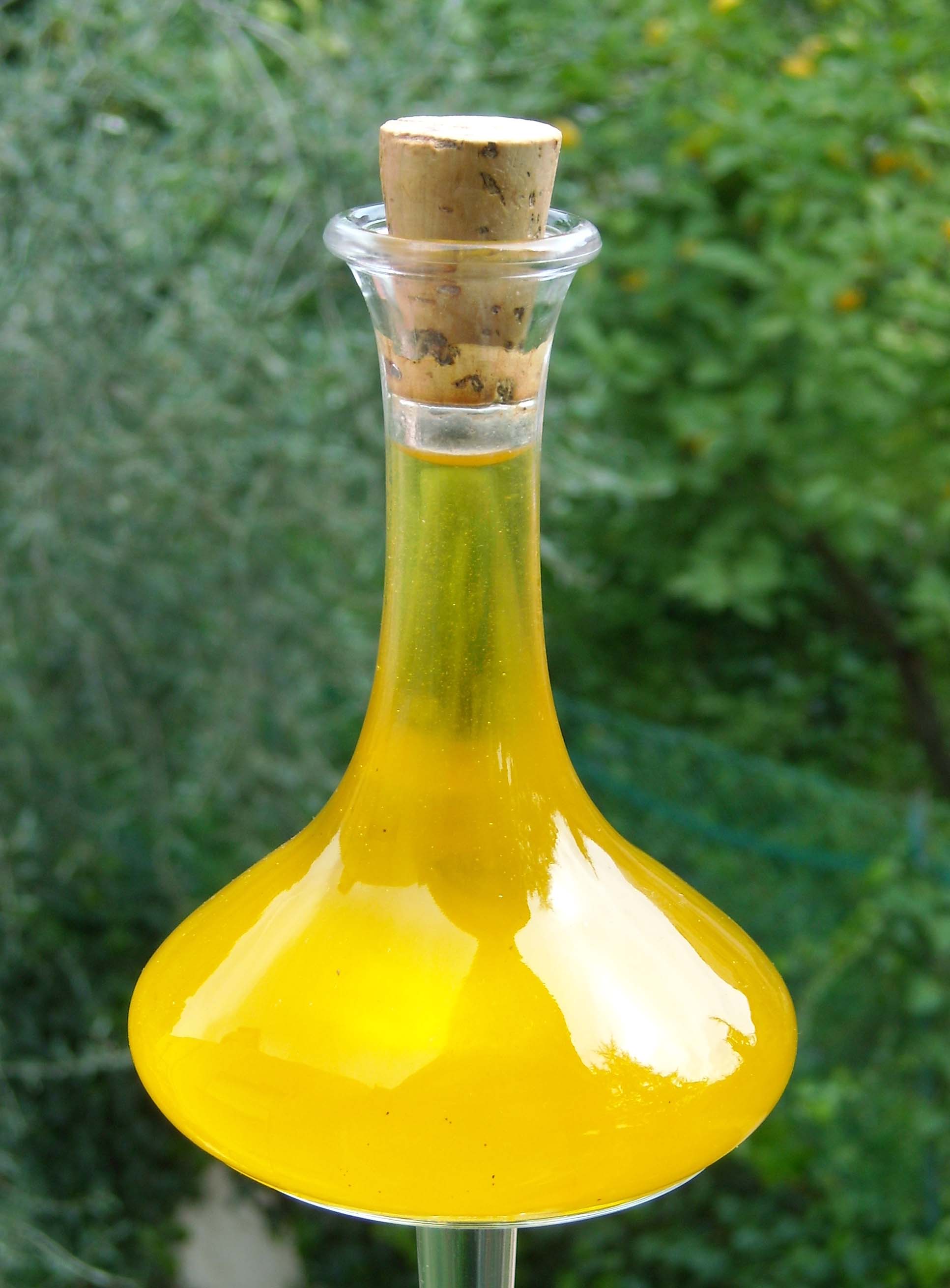 Bottle of vegetable oil with cork stopper