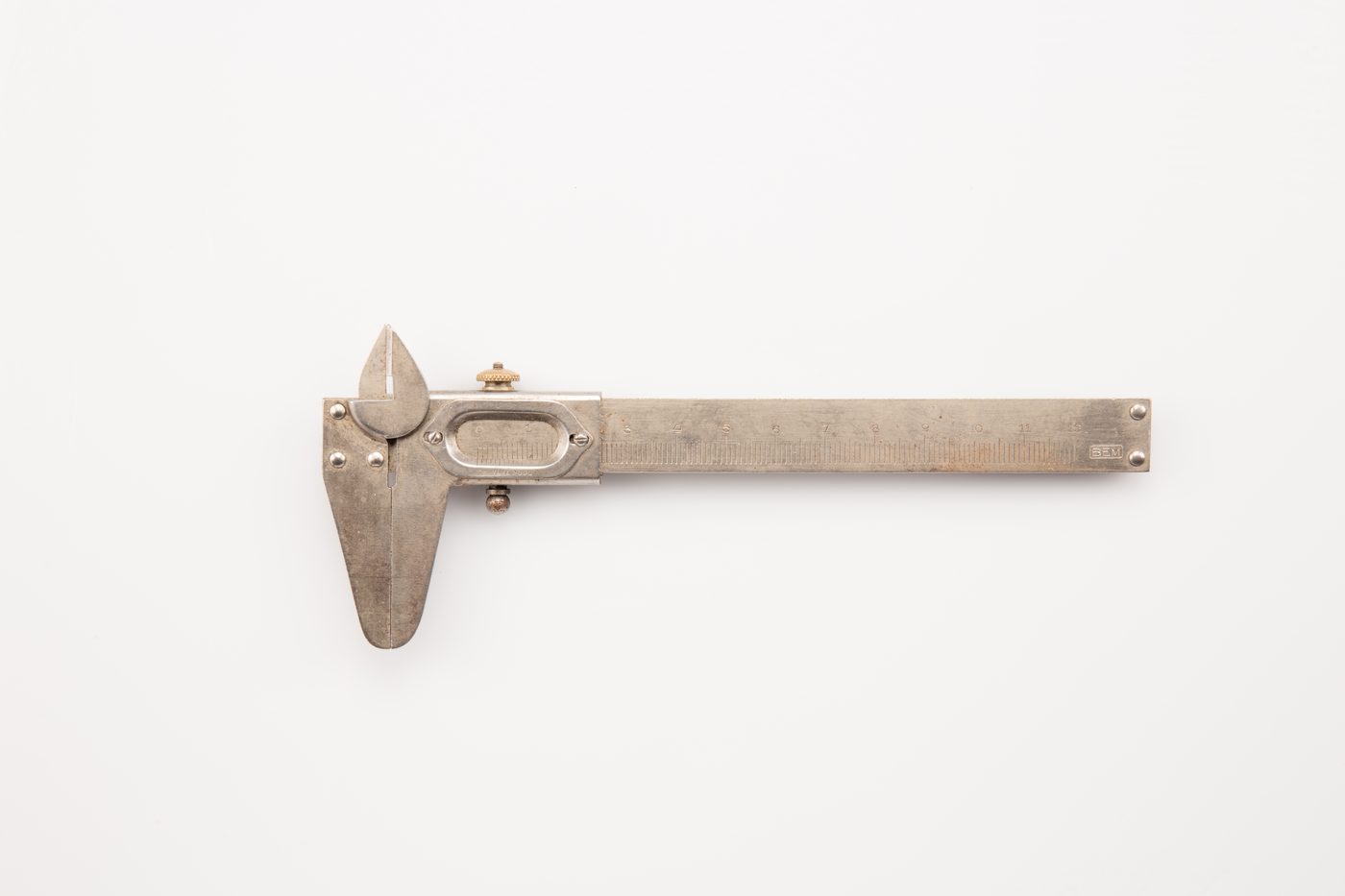 A vernier caliper on white background