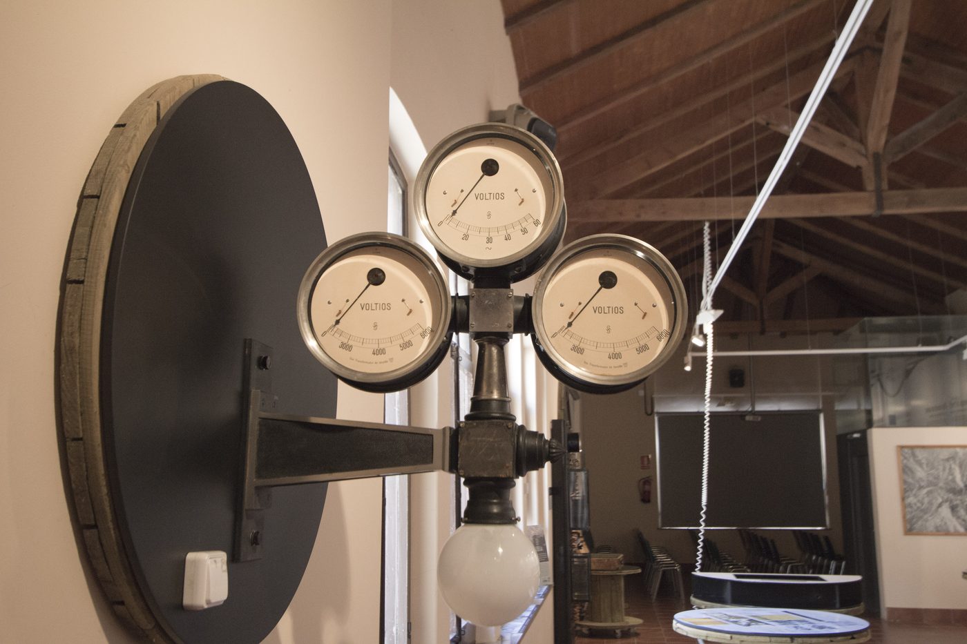 Analog voltmeters mounted on a wall